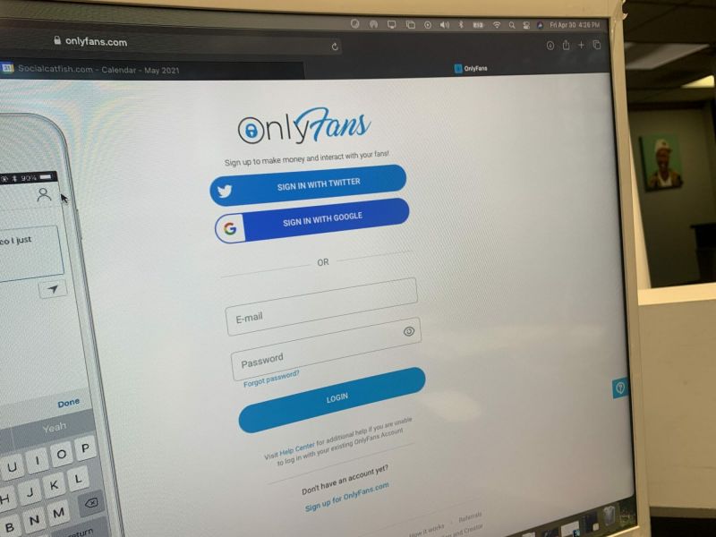 A laptop displaying the OnlyFans login screen, representing methods for searching deleted OnlyFans accounts and finding archived creator profiles online.